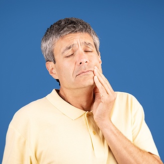 Senior man experiencing dental pain